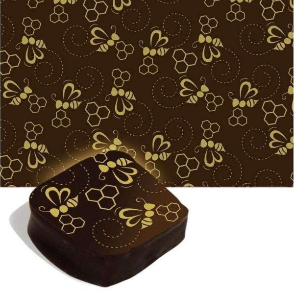 Chocolate Transfer Sheet with bee and honeycomb in gold color | Transfer para chocolate com abelhas e favo de mel em dourado.